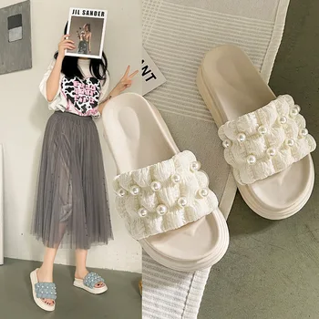 2023 Весна/лето Новые Xiaoxiang ветрозащитные тапочки для женщин Верхняя одежда Модные пляжные тапочки с прямой подошвой на толстой подошве